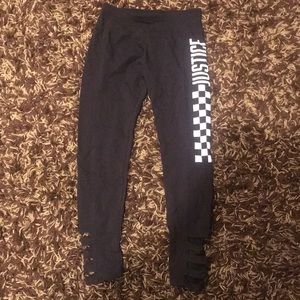 black leggings with one checkered side